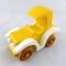 A handmade wooden toy car vintage style coupe painted nontoxic bright yellow and white with spoked wheels finished with nonmarring amber shellac from my  Bad Bobs Custom Motors Collection.