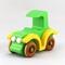 A handmade wooden toy car vintage style coupe painted nontoxic bright green and yellow with spoked wheels finished with nonmarring amber shellac, from my  Bad Bob's Custom Motors Collection.