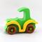A handmade wooden toy car vintage style coupe painted nontoxic bright green and yellow with spoked wheels finished with nonmarring amber shellac, from my  Bad Bob's Custom Motors Collection.