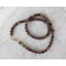 Vintage multicolor beaded necklace with gold accents