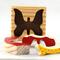 A wooden three-piece butterfly tray puzzle, handmade and finished. The butterfly is painted bright red and yellow with orange spots. The wooden tray is finished with clear shellac. It is one of four puzzles in my Puzzle Pals Collection.