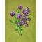Purple Tulips on a green bamboo towel Closeup