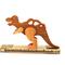 Handmade wooden toy dinosaur figurine made from select grade hardwoods and finished with a custom blend of nontoxic oils and waxes.