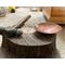 photo of wooden stump with carved depression, ball peen hammer used to handhammered copper dish