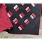 Bold geometric quilt in red and black, handmade in USA