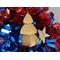 Handmade Wood Birdhouse Ornament Collectable Christmas Tree Ornament shapeed like a Christmas tree. Made from select-grade hardwoods, hand-sanded, and finished with a custom blend of oils and waxes using traditional woodworking tools.