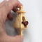Handmade Wood Miniature Birdhouse Ornament crafted using only the finest select hardwoods and traditional woodworking tools. Each ornament is individually finished with a blend of mineral oil and beeswax to bring out the natural beauty of the wood.
