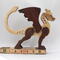 Handmade wood dragon figurine made from select grade contrasting hardwoods and hand-finished with a custom mixture of mineral oil and waxes.