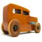 This handmade wooden toy car is based on a 1932 Ford Sedan Hot Rod. It is hand-finished with multiple coats of amber shellac and trimmed with black and grey acrylic paint.