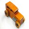 This handmade wooden toy car is based on a 1932 Ford Sedan Hot Rod. It is hand-finished with multiple coats of amber shellac and trimmed with black and grey acrylic paint.