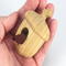 Handmade Wood Birdhouse Ornament Collectable Christmas Tree Ornament shapeed like a Christmas tree. Made from select-grade hardwoods, hand-sanded, and finished with a custom blend of oils and waxes using traditional woodworking tools.