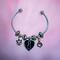 Cat memory bracelet with an urn for cremation ashes.