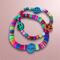 Hippie colorful peace bracelet. Handmade on a stretch cord.