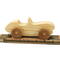 A handcrafted wooden toy convertible sports car, finished with a custom blend of oils and waxes, is the perfect gift for young children.