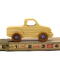 Handmade wooden toy pickup truck finished with a blend of mineral oil and beeswax and painted with metallic sapphire blue trim.