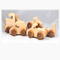 Handmade wooden toy truck play set includes three cars and a tractor-trailer finished with clear and amber shellac with metallic sapphire blue trim.