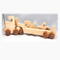 Handmade wooden toy truck play set includes three cars and a tractor-trailer finished with clear and amber shellac with metallic sapphire blue trim.