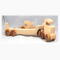 Handmade wooden toy truck play set includes three cars and a tractor-trailer finished with clear and amber shellac with metallic sapphire blue trim.