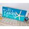Just Beachy Sign with Real Starfish

Enhance the coastal charm of your living space with this exquisite seaside masterpiece featuring the uplifting phrase "Just Beachy!" Its vibrant ocean blue hues and authentic starfish detail make this whimsical 5.5 x 12-inch sign a perfect complement to your beach house decor. Whether hung on a wall or displayed on a shelf, mantel, or window sill, this delightful piece comes ready to add a touch of tropical beach vibes to any room.​