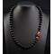 Asymmetrical Red Agate and Onyx beaded necklace.