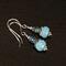 Aqua chalcedony, apatite, and sterling silver earrings.