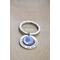 Silver key chain with custom fingerprint charm encircled by hand-stamed Forever in my heart charm on neutral wood background.