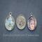 Size comparison of two photo charms next to a dime, one personalized with a name, and one without. 
