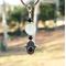 Prehnite and Black Tourmaline Protection Amulet Hamsa Keychain by Rock My Zen
