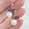 White button pearl earrings topped with a cluster of red garnet wire wrapped beads in sterling silver by MariesGems.