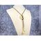 Peridot jasper donut pendant and teardrop tassels with bronze SilverSilk knitted wire chain.