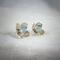 Prong-set blue topaz studs with sterling silver tulip cup earrings jackets by MariesGems.