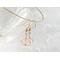 Rose quartz earrings wire wrapped with Swarovski pearls in 14K gold filled wire by MariesGems.