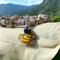 A very cute honeybee charm on a stretch bracelet of wooden, glass and metal beads.