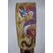 The legendary Dragon and Phoenix play out their eternal balance on this intricately detailed hand painted guitar strap. The art features prominently on this guitar strap. The adjustment loops on the front and back allow for a completely custom fit and feel. The Dragon and Phoenix have been painted with pearlescent and metallic specialty leather paints in all the colors of fire - bringing all the details to life. Close up of dragon in studio light