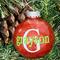 Red Christmas Round 3" Ornament with a single white initial in the center with a name decal layered on top in lime green.  