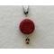 Red pendant to wear with black beaded necklace