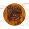 A handcrafted English Walnut Cheese Board featuring an engraved Jaguar Eye design.