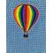 Striped hot air balloon on blue colored towel