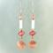 Copper Fish Earrings with white enameled bugle bead and copper saucer bead, all handmade from scratch