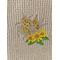 Closeup of corn, wheat, and yellow flowers on a beige microfiber towel