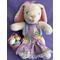 Large female Easter bunny dressed in design and handcrafted pinafore.  She has a metal pink basket filled with Easter eyes.  A nice holiday keepsake. She really is a very cute bunny for a younger girl.  What a lovely gift that will last a lifetime and be remembered  forever and special.