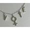 Silver paperclip chain necklace with charms spelling "VOTE" and the venus, female sign in place of the letter "O".