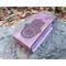 This Premium Handmade Leather Tarot Card Case features a a Hamsa Hand symbol. The Tarot Card Box has been hand crafted, hand dyed and hand sewn in our shop. The leather Tarot Deck Holder is dyed in a color called Violet Cosmos which includes many purple and violet tones