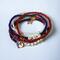 Red, white and blue stretchy stacking bracelets.