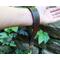 Classic red roses with deep green foliage adorn this handmade leather wrist strap, which was cut, etched, dyed and painted right here in our shop. Made from incredibly strong and durable vegetable tanned full grain leather, the wrist strap is hand dyed in Antique Black with a slightly distressed or vintage look.