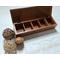 5-compartment in this wooden tea box for organizing tea bags.