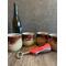Four brown hand-thrown ceramic wine tumblers, each tumbler holds 12 ounces.