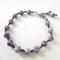 Hand knotted purple matte druzy beaded bracelet with extender chain.