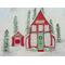 Watercolor and ink art print of Santa's red Workshop decorated for Christmas, featuring a separate building with Santa's sleigh inside. 