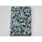 A padded book sleeve  made with a blue floral Rifle Paper Co. cotton print called Garden Party Blue.